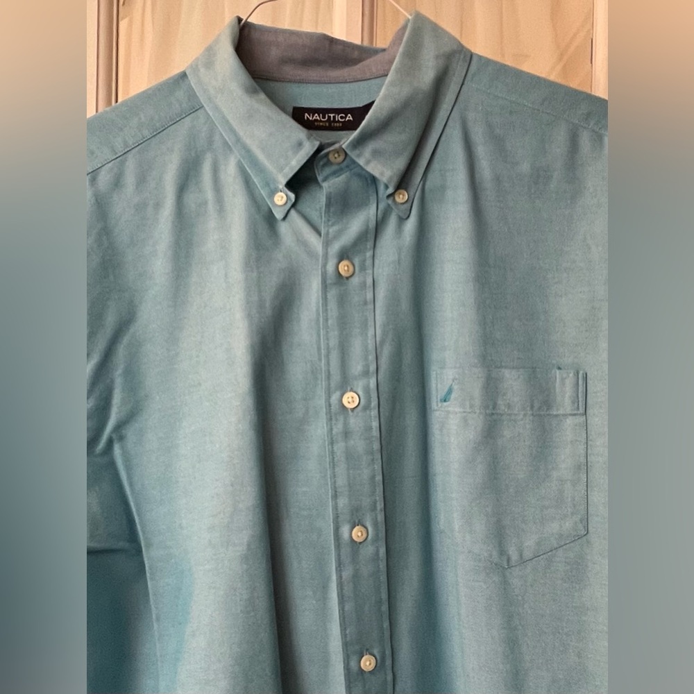 Nautica teal blue long sleeve L men’s dress shirt. Contrast collar and cuff.